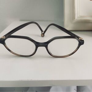 Carolina Herrera Black and Gold Frame